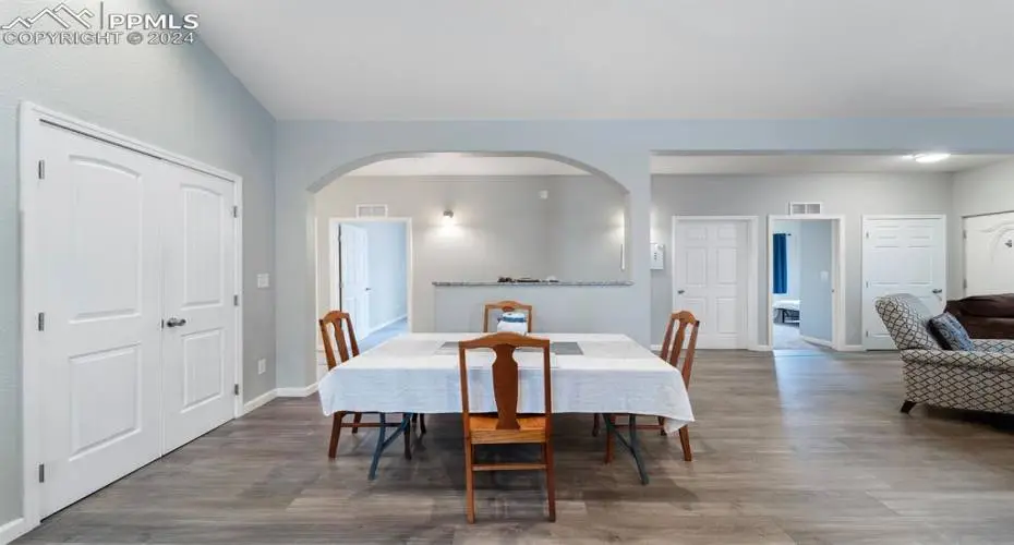 Dining room with hardwood / wood-style flooring